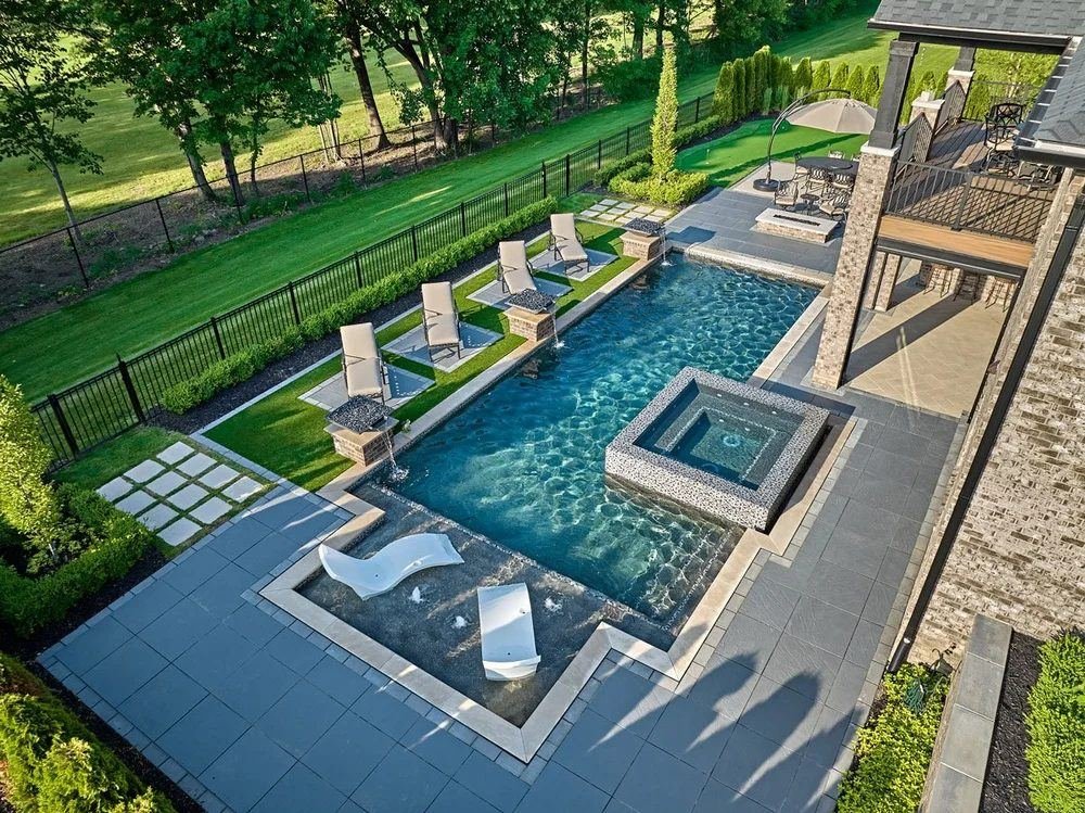 Custom pool with spa and sun loungers