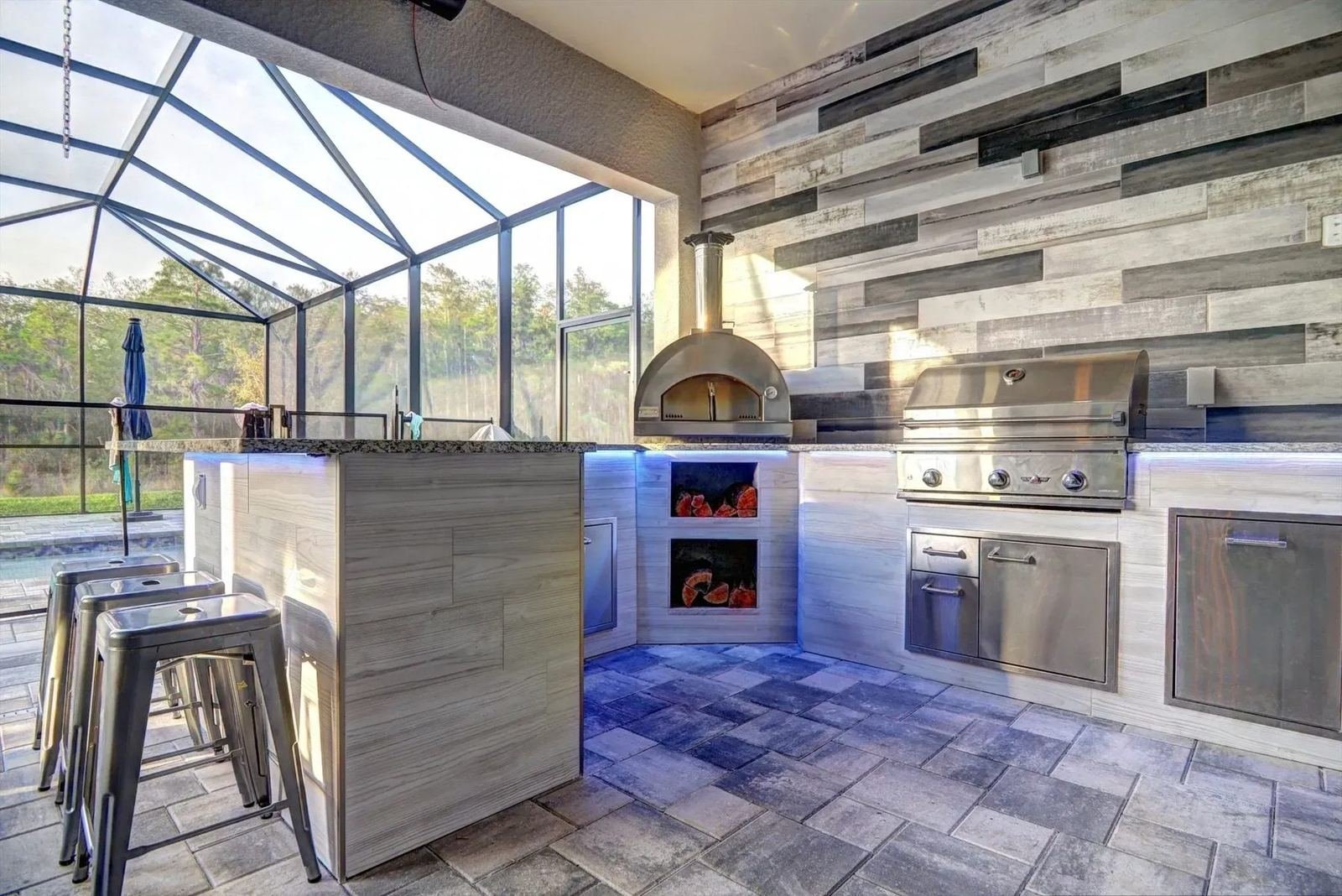 Outdoor kitchen with a pizza oven