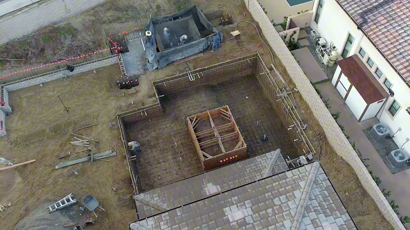 Custom pool under construction in a Sarasota backyard